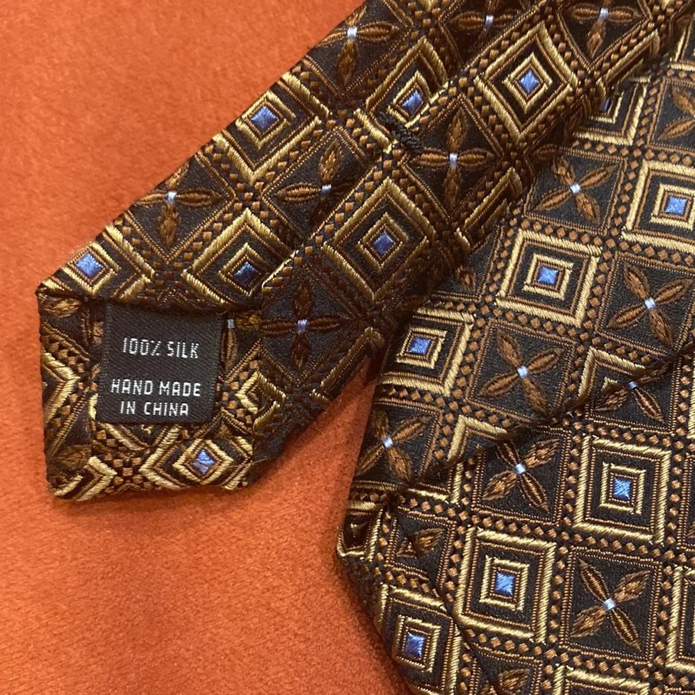 JoS.A.  Bank NWOT hand made brown and tan silk tie